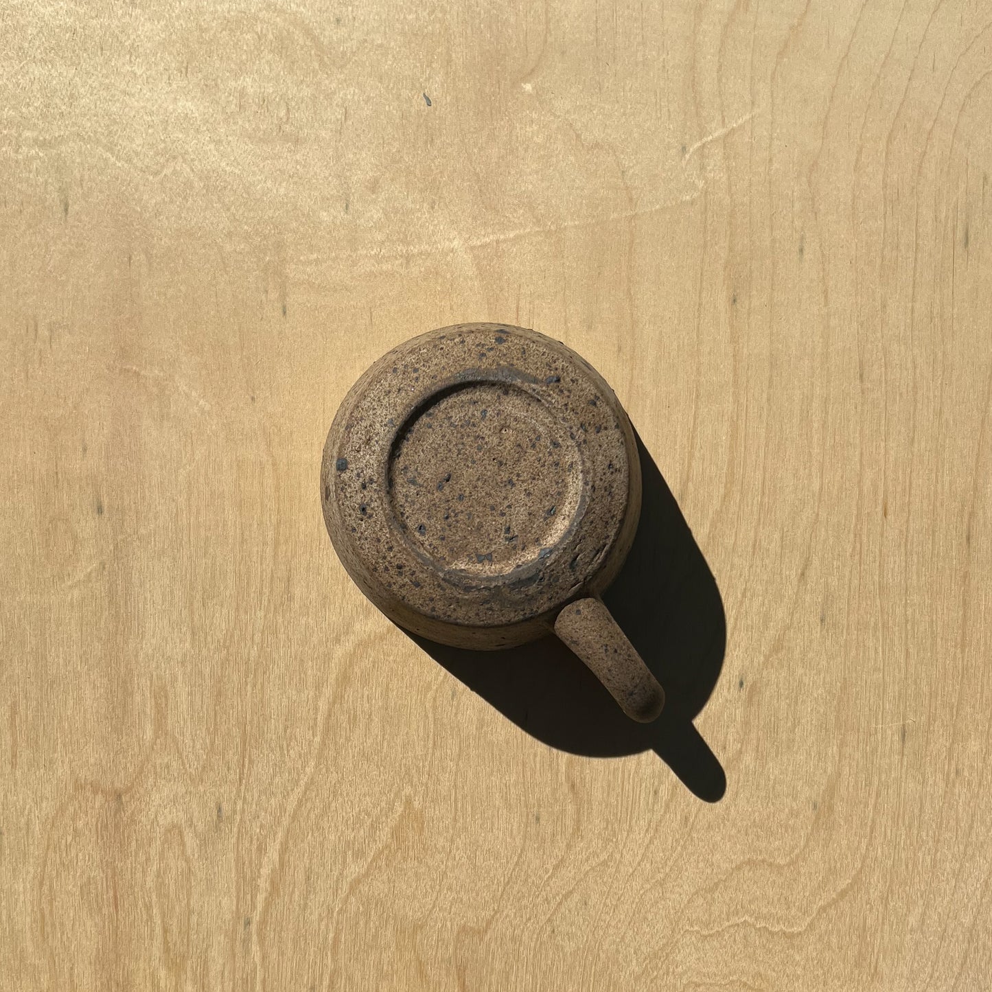 Bottom of pine ash glazed mug